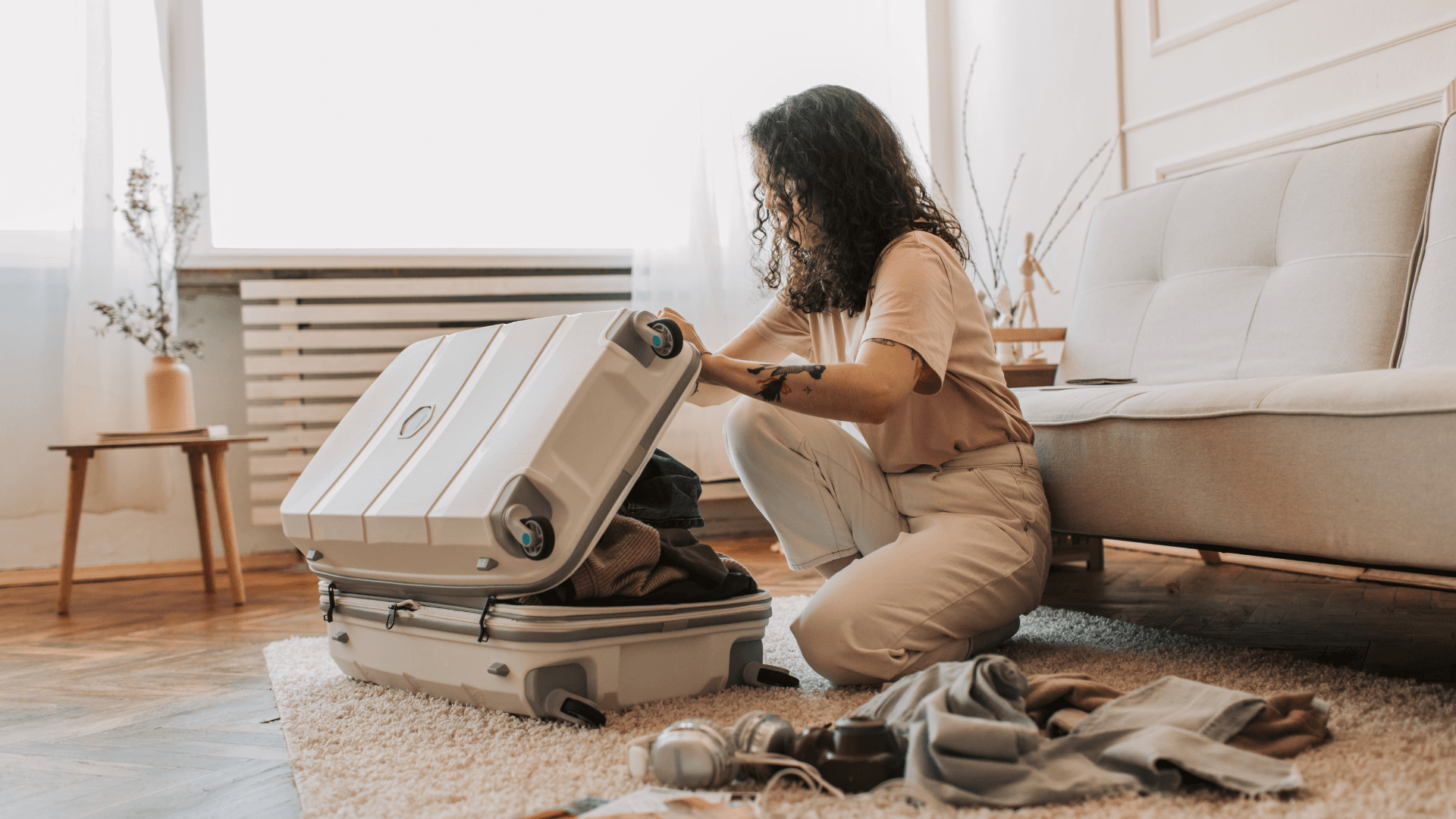 A Woman Packing Her Luggage